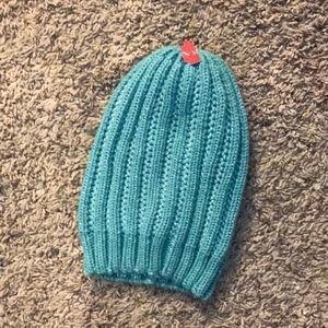 Blue knit pullover cold-weather sparkle hat beanie